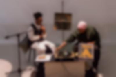 S\*an D. Henry-Smith (left) and Derrais Carter (right). Book launch. *Black Revelry: In Honor of 'The Sugar Shack'*, edited by Carter with contributions from Taylor Renée Aldridge; Samiya Bashir; La Marr Jurelle Bruce; Derrais Carter; DJ Lynnée Denise, William H. Mosley, III, Zoé Samudzi, S\*an D. Henry-Smith, Melanie Stevens and Phillip B. Williams. Design by Karoline Świeżyński. Photo: Konstantin Guz, courtesy of If I Can't Dance, Amsterdam.