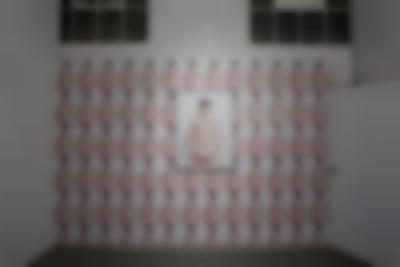 Installation image.  Heather Cassils, *Advertisement (Homage to Benglis)*, 2011. Photograph and Xerox copies; Key art: 30 x 40 inches, and tabloid-sized Xerox: 11 x 17 inches. Key image ©Heather Cassils and Robin Black 2011. Wall installation ©Heather Cassils 2011. Installation photo: Joshua White, courtesy of LACE (Los Angeles Contemporary Exhibitions).