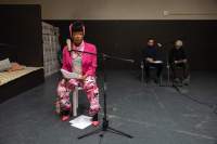 Left to right: Joy Mariama Smith, Szymon Adamczak, Sher Doruff. Public reading documentation. Grant Watson, *How We Behave / An Archive of Radical Practice*, If I Can't Dance, Amsterdam, December 2023. Photo: Maarten Nauw, courtesy of If I Can't Dance, Amsterdam.