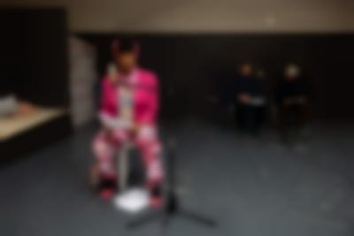 Left to right: Joy Mariama Smith, Szymon Adamczak, Sher Doruff. Public reading documentation. Grant Watson, *How We Behave / An Archive of Radical Practice*, If I Can't Dance, Amsterdam, December 2023. Photo: Maarten Nauw, courtesy of If I Can't Dance, Amsterdam.