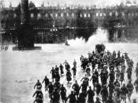 In 1920, under the direction of Nikolai Evreinov, thousands of participants (including Vladimir Lenin and thousands of Red Guards) reenacted the storming of the tsar's Winter Palace three years earlier, a pivotal moment in the October Revolution. Sergey Eisenstein used footage from the event in his film *October: Ten Days that Shook the World* (1928).