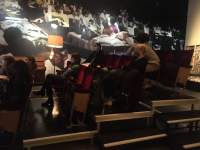 Students watch a film installation at *All About Theatre About Film* by Ivo van Hove and Jan Versweyveld. EYE Filmmuseum, Amsterdam, 2021.