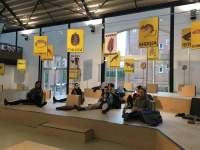 Students attend a lecture within the frame of *Court for Intergenerational Climate Crimes (CICC)* by Jonas Staal and Radha D'Souza. Framer Framed, Amsterdam, 2021.