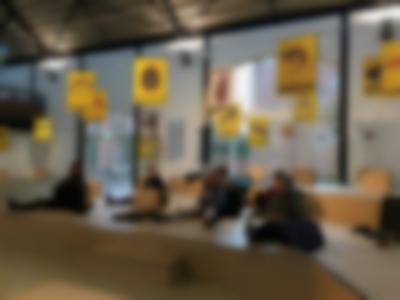 Students attend a lecture within the frame of *Court for Intergenerational Climate Crimes (CICC)* by Jonas Staal and Radha D'Souza. Framer Framed, Amsterdam, 2021.