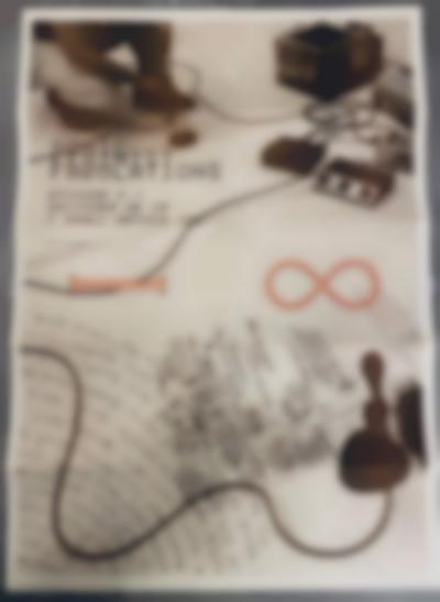 A photo of sound equipment and a microphone set on the floor fill up the whole page. On the top left corner, we can see the bottom half of a person squatting down. Beneath them, black text reads: 