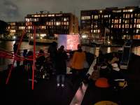 *Cinema for Houseboats I: Vlado Kristl* public program (October 2021). Zone Collective (Kirila Cvetkovska and Megan Hoetger), *Shadow Zones: Experimental Cinema History in Yugoslavia; or, a Cinema and a History Made and Unmade by Maps*, When Site Lost the Plot, Amsterdam, July - October 2021. Photo: Aram Lee, courtesy of When Site Lost the Plot.