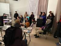 Post-screening discussion. *Cinema for Houseboats* public program film night (October 2021). Zone Collective (Kirila Cvetkovska and Megan Hoetger), *Shadow Zones: Experimental Cinema History in Yugoslavia; or, a Cinema and a History Made and Unmade by Maps*, When Site Lost the Plot, Amsterdam, July - October 2021. Photo: Aram Lee, courtesy of When Site Lost the Plot.