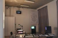 Exhibition installation view. Zone Collective (Kirila Cvetkovska and Megan Hoetger), *Shadow Zones: Experimental Cinema*
*History in Yugoslavia; or, a Cinema and*
*a History Made and Unmade by Maps*, When Site Lost the Plot, Amsterdam, July - October 2021. Photo: Quenton Miller, courtesy of When Site Lost the Plot.