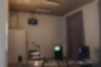 Exhibition installation view. Zone Collective (Kirila Cvetkovska and Megan Hoetger), *Shadow Zones: Experimental Cinema*
*History in Yugoslavia; or, a Cinema and*
*a History Made and Unmade by Maps*, When Site Lost the Plot, Amsterdam, July - October 2021. Photo: Quenton Miller, courtesy of When Site Lost the Plot.